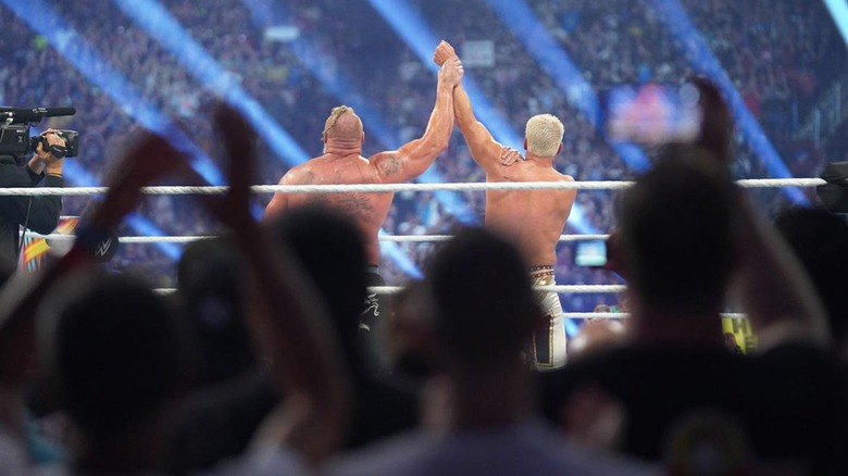 Brock Lesnar Raises Cody Rhodes' Arm