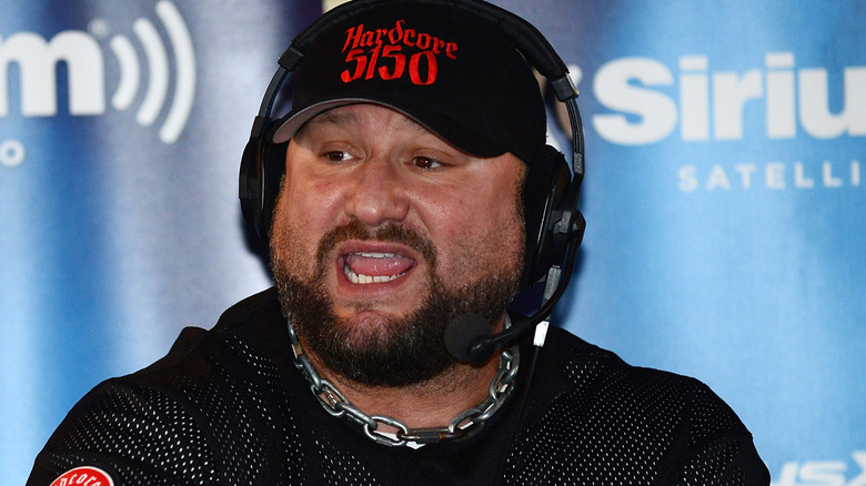 Bully Ray wearing a headset and a hat