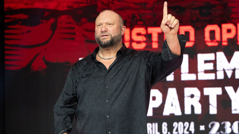 Bully Ray puts his finger up just before he makes an important point during a "Busted Open" tour event