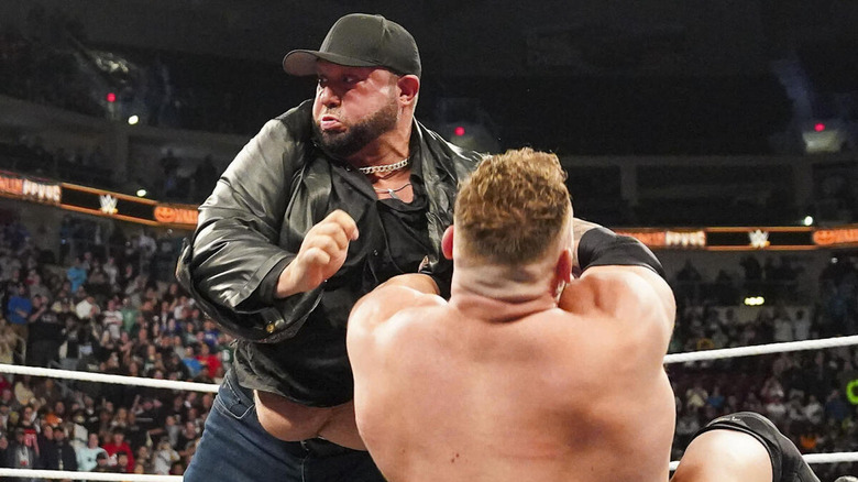 Bully Ray shoulder tackles Ridge Holland