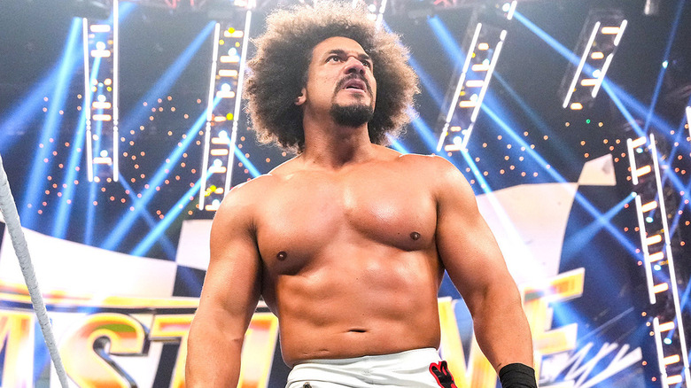 Carlito wearing white ring trunks