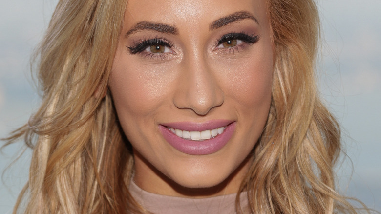 Carmella smiling