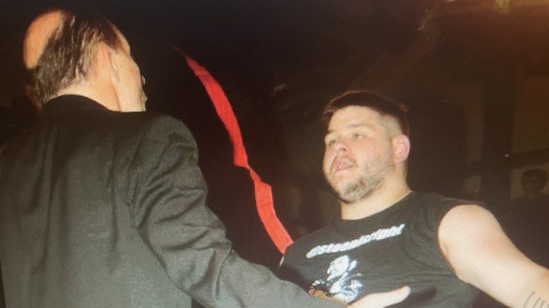 Cary Silkin hugs Kevin Steen