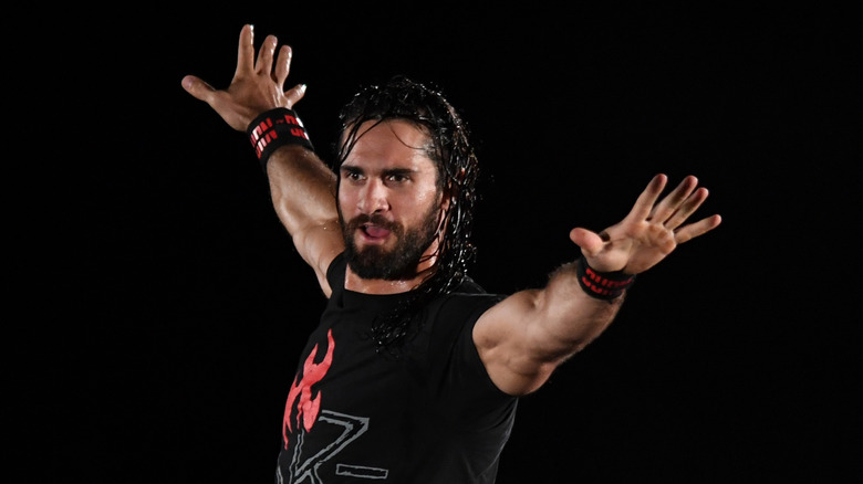 Seth Rollins arms outstretched