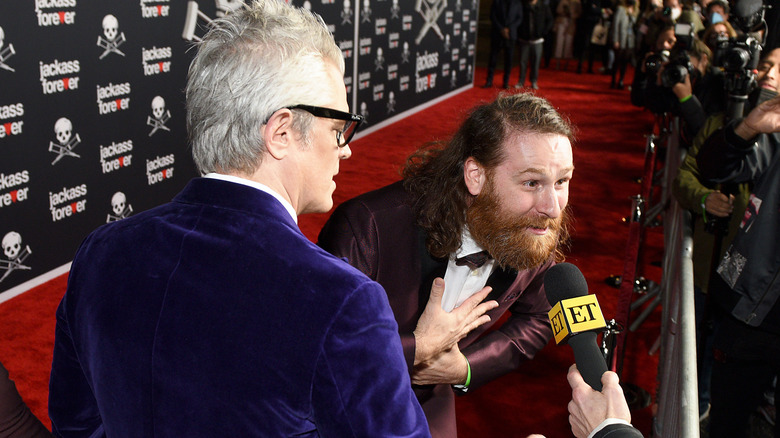 Johnny Knoxville and Sami Zayn attend the U.S. premiere of "jackass forever" at TCL Chinese Theatre on February 01, 2022 in Hollywood, California.