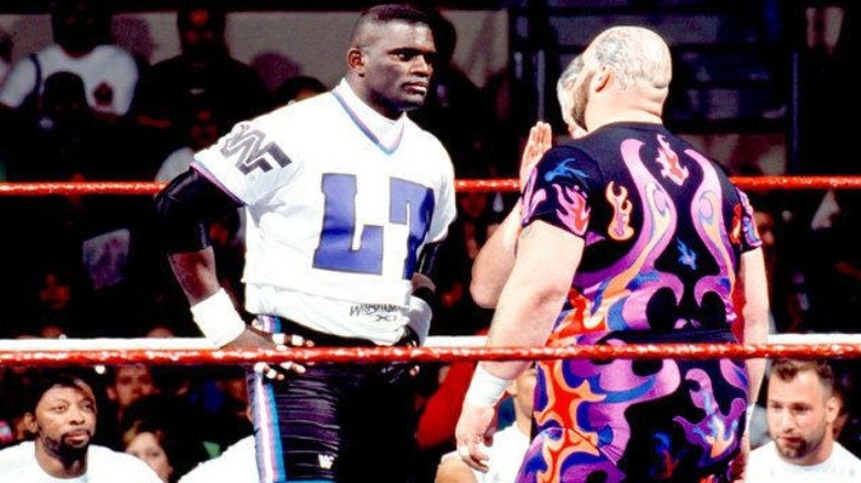 Lawrence Taylor looks at Bam Bam Bigelow WrestleMania