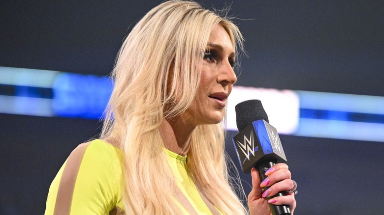 Charlotte Flair speaking to the fans