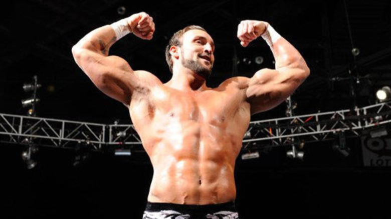 Chris Masters flexing