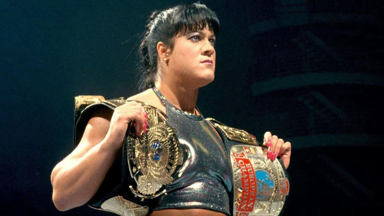 Chyna holding titles