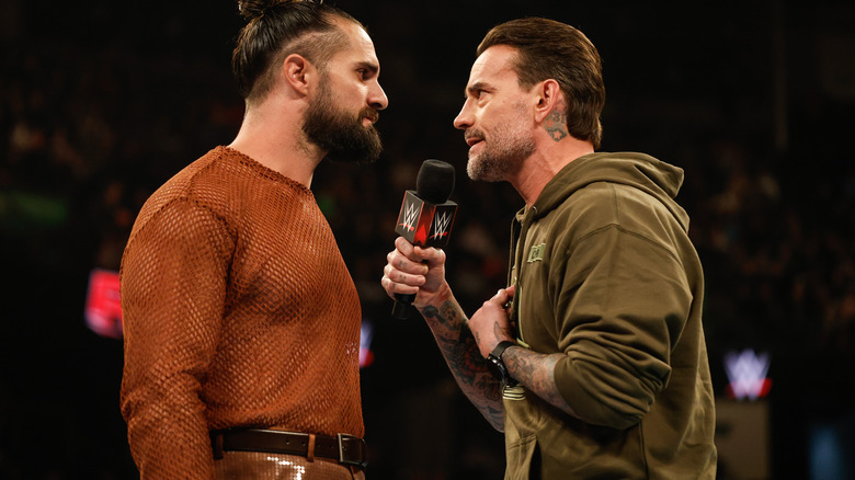 Seth Rollins and CM Punk exchange words on "WWE Raw"