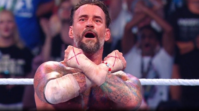 CM Punk crossing his forearms