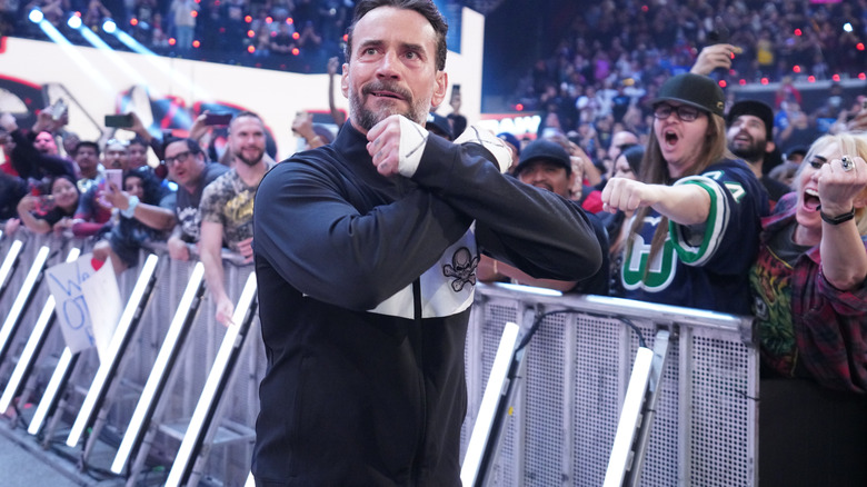 CM Punk makes his entrance during 