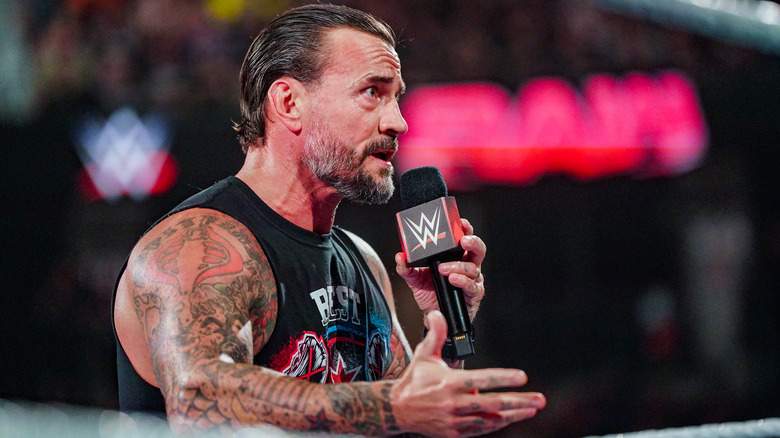 CM Punk addresses the "WWE Raw" crowd.