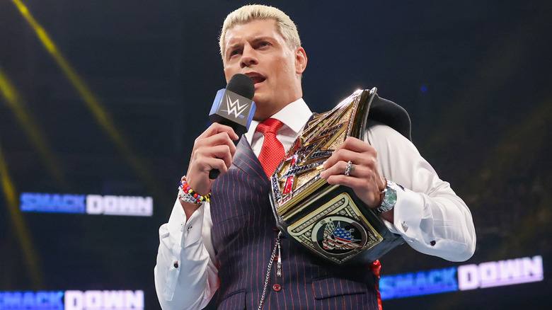 Cody Rhodes talking into a microphone