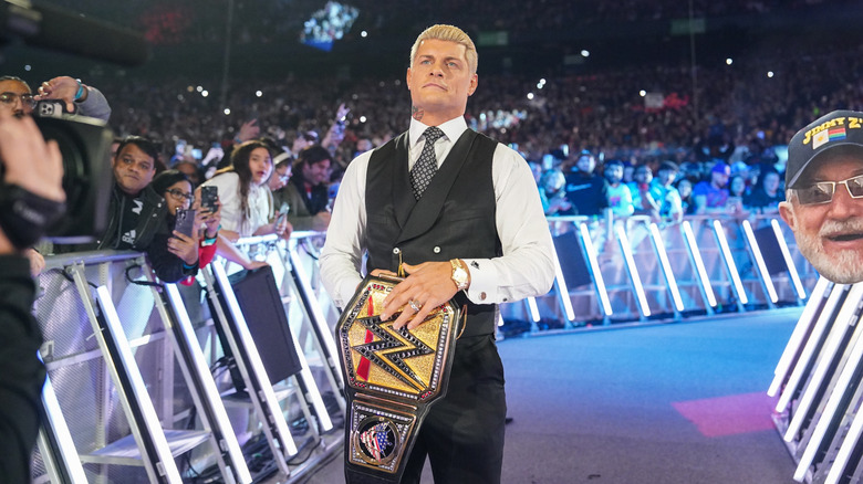 Cody Rhodes pats his Undisputed WWE Title Belt