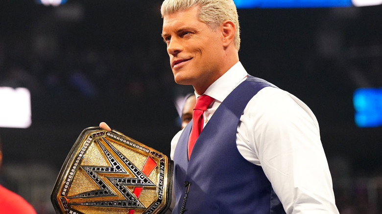 Cody Rhodes shows off his title belt