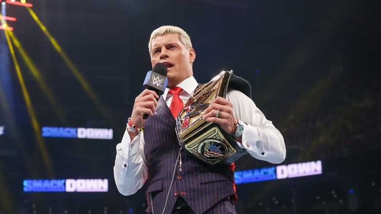 Cody rhodes holding WWE championship