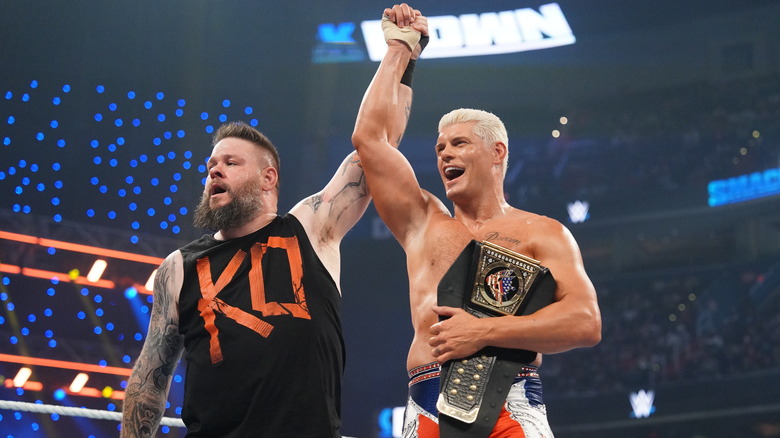 Kevin Owens and Undisputed Champion Cody Rhodes celebrate after their match during SmackDown at Capital One Arena on August 23, 2024 in Washington, DC.