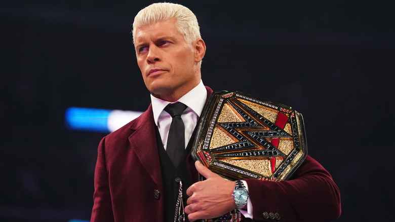 Cody rhodes holding WWE championship