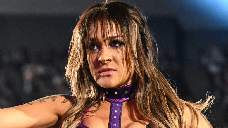 Dakota Kai looking unhappy prior to entering the ring