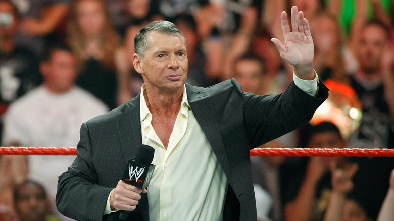 Vince McMahon waves