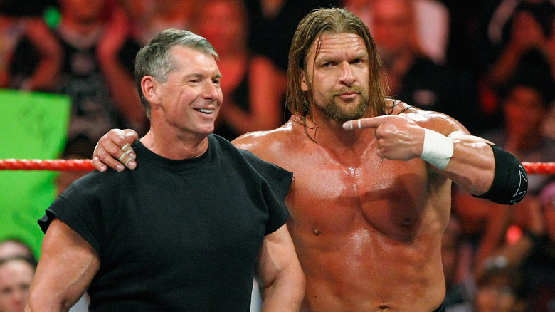 Triple H points at Vince McMahon