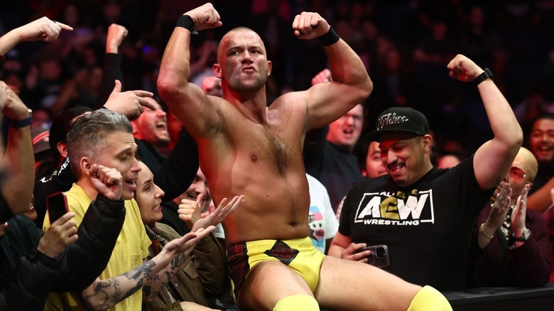 Daniel Garcia poses on the ringside barricade on "AEW Collision"