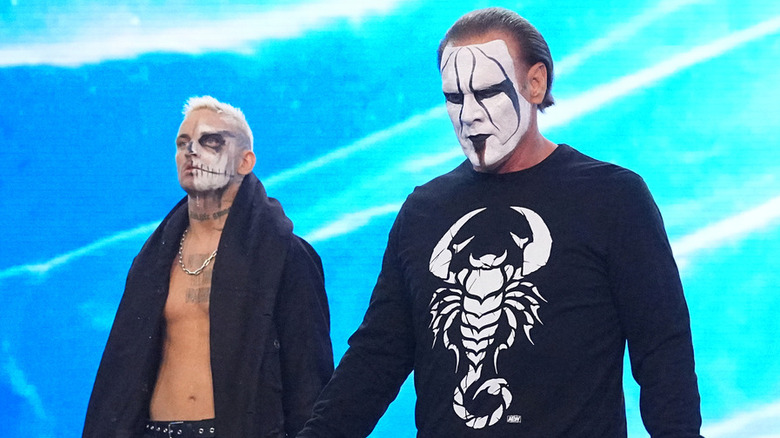 Darby Allin & Sting walking down entrance ramp