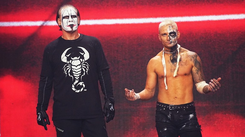 Darby Allin & Sting pose during their entrance