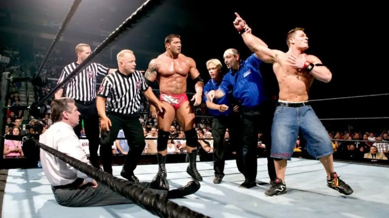 Vince McMahon, Batista, and John Cena