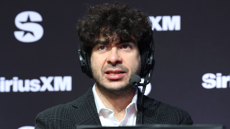 Tony Khan on a headset