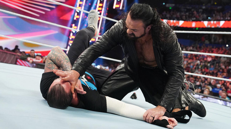 Drew McIntyre attacks CM Punk on "WWE Raw"