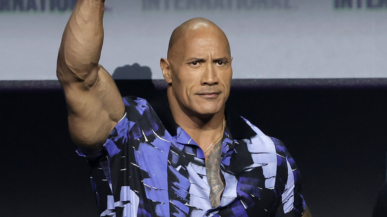 The Rock lifts his fist