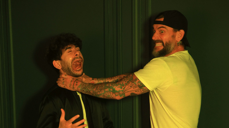 CM Punk choking Tony Khan