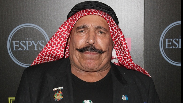 The Iron Sheik poses for a photo