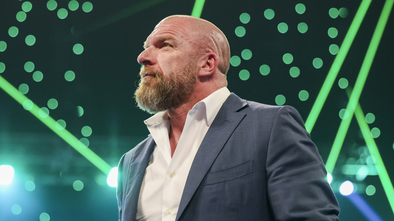 Triple H with green lighting