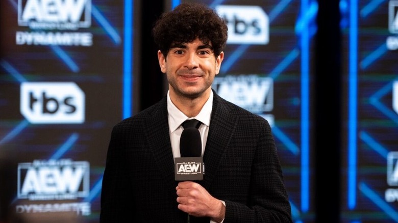 President of AEW, Tony Khan, awaits to deliver a special message to fans