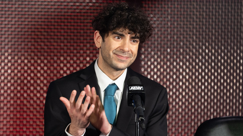 Tony Khan at a press conference 