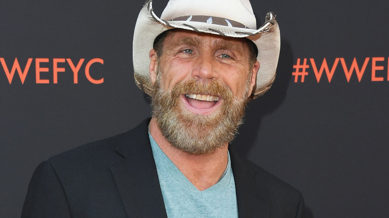 Shawn Michaels is wearing a white cowboy hat