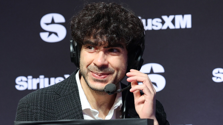 AEW CEO Tony Khan smiling