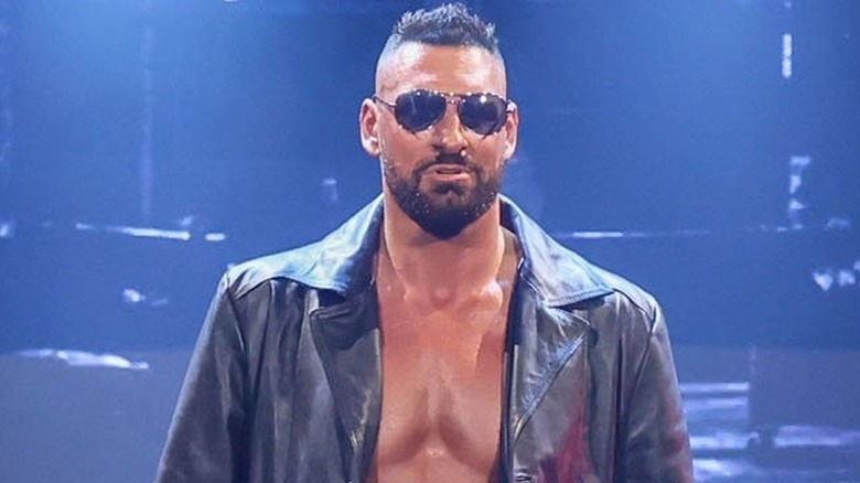 Dijak wearing leather and sunglasses