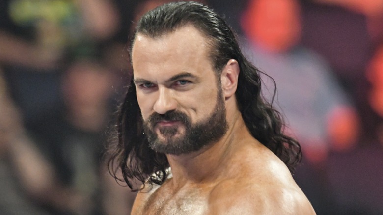 Drew McIntyre smiling WWE ring