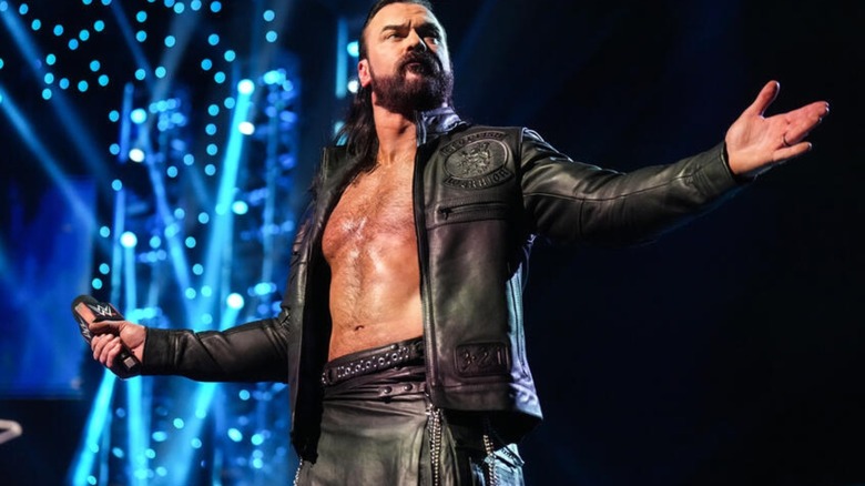 Drew McIntyre stands with arms wide