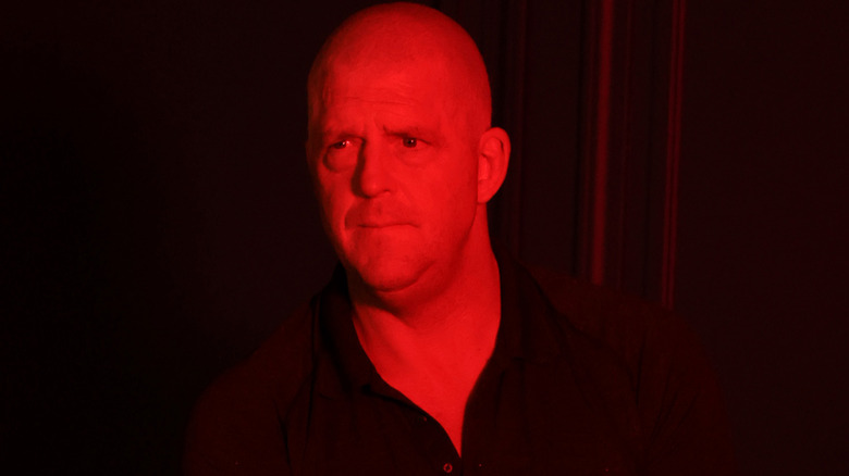 Dustin Rhodes under a red light