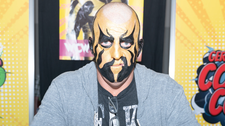 Dustin Rhodes wearing gold and black paint