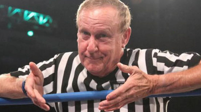 Earl Hebner officiates a match at Impact Wrestling
