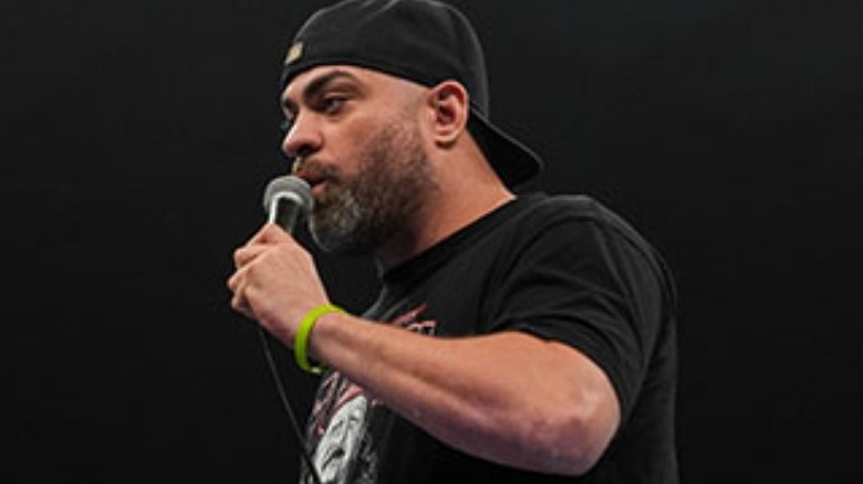 Eddie Kingston with a mic