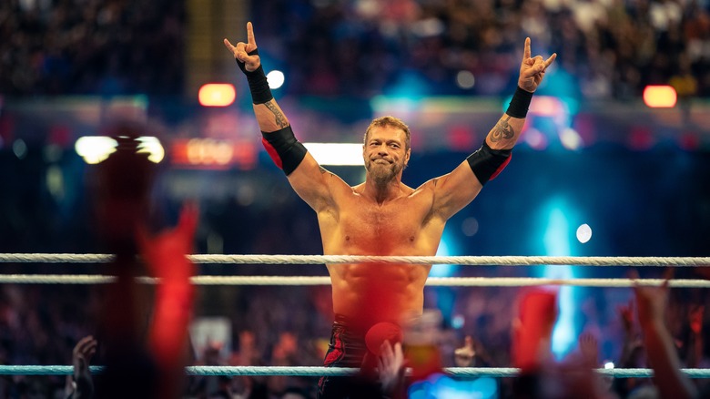 Edge celebrating in the ring