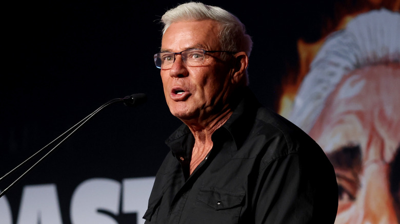 Eric Bischoff is wearing glasses