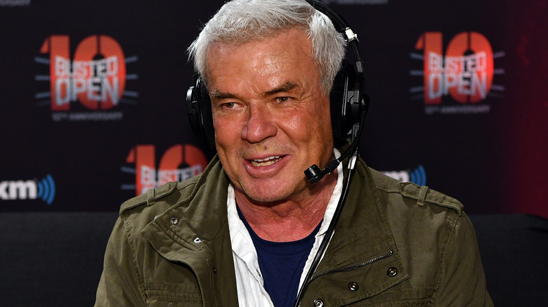 Eric Bischoff is wearing a headset